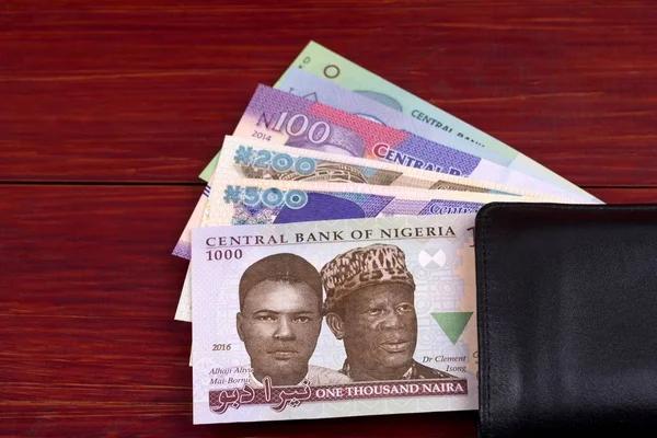 The Nigerian naira fell the most in 24 years and became one of the three worst currencies in the world 