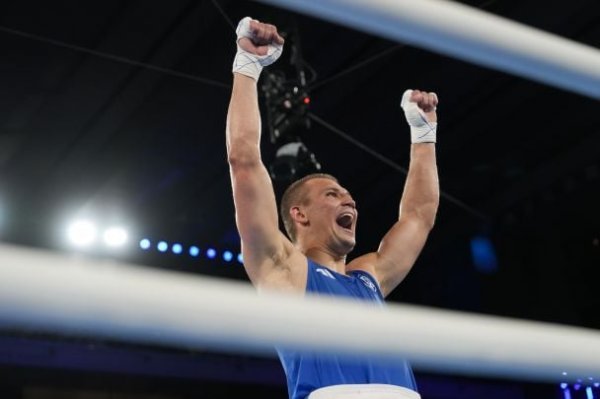  Third gold medal for Ukraine: spectacular photos of Khyzhnyak's triumphant fight in the 2024 Olympics final 