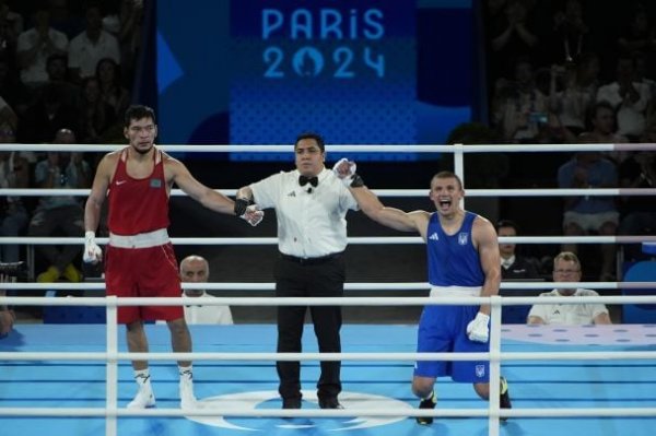  Third gold medal for Ukraine: spectacular photos of Khiznyak's triumphant fight in the 2024 Olympics final 