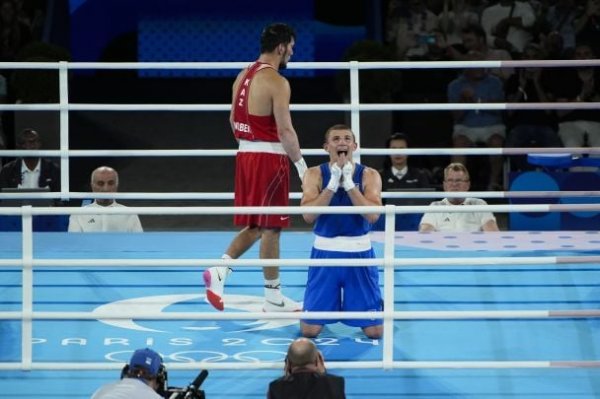  Third gold medal for Ukraine: Spectacular photos of Khyzhnyak's triumphant fight in the 2024 Olympics final 