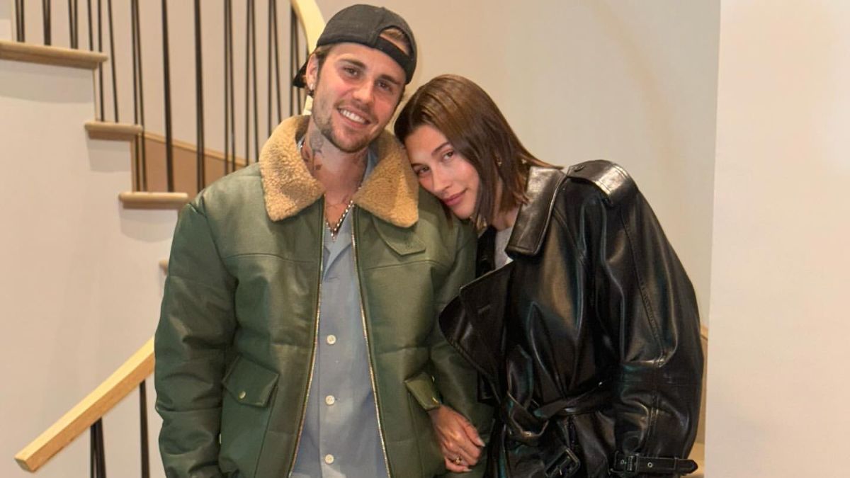Justin Bieber shared romantic photos with his wife Hailey amid divorce rumors and revealed their son for the first time during a family vacation.