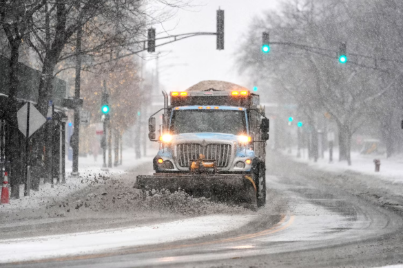 A major snowstorm hits the Midwest, canceling 1,400+ flights and causing a 45-car pileup, with dangerous travel conditions and delays at Chicago airports.