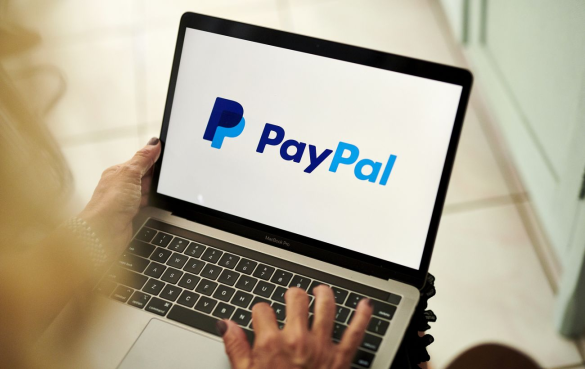 PayPal faces potential acquisition after stock falls nearly 50%, with new CEO Enrique Lores taking charge amid rising competition in digital payments.
