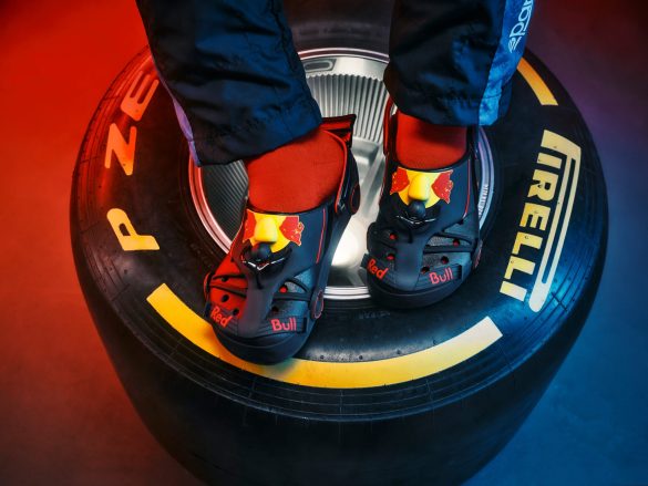 Red Bull Racing x Crocs launches May 21 with RB22-inspired clogs, Classic Runner shoes, and Formula 1 Jibbitz charms for collectors and fans.