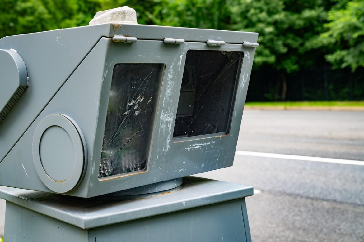 Roadside speed enforcement camera beside a Maryland road