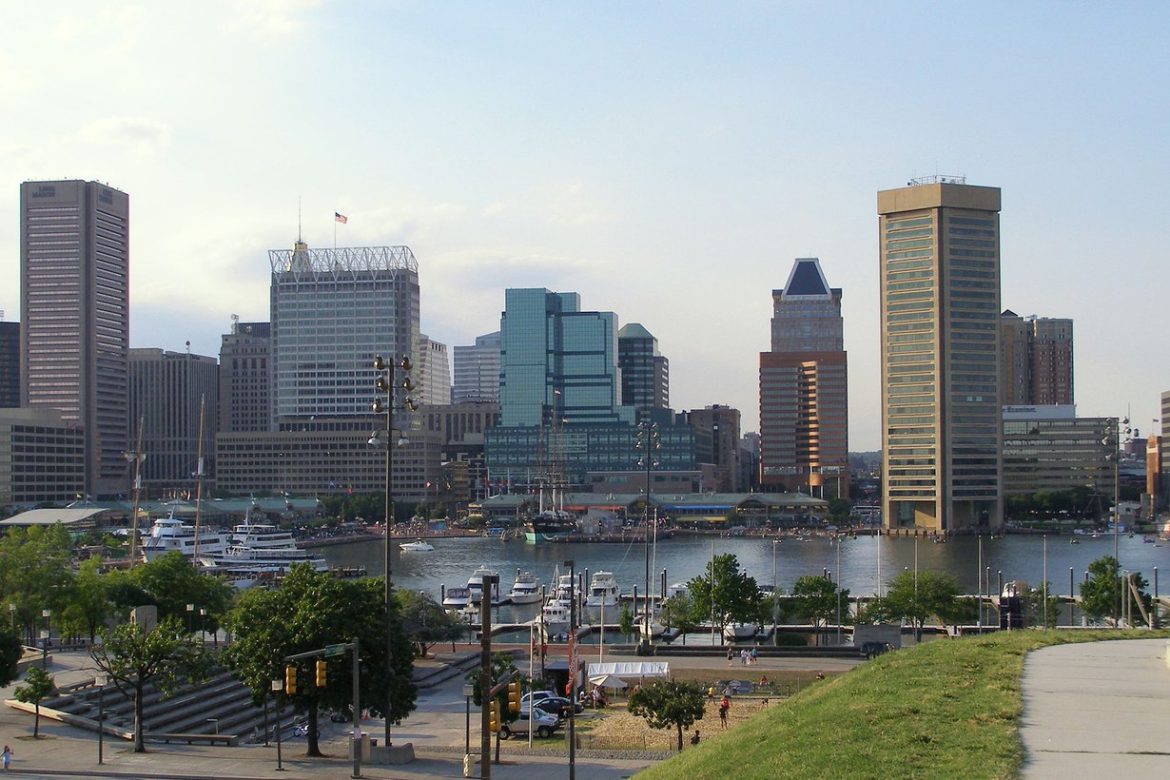 Baltimore skyline and Inner Harbor seen from Federal Hill Park on a sunny day