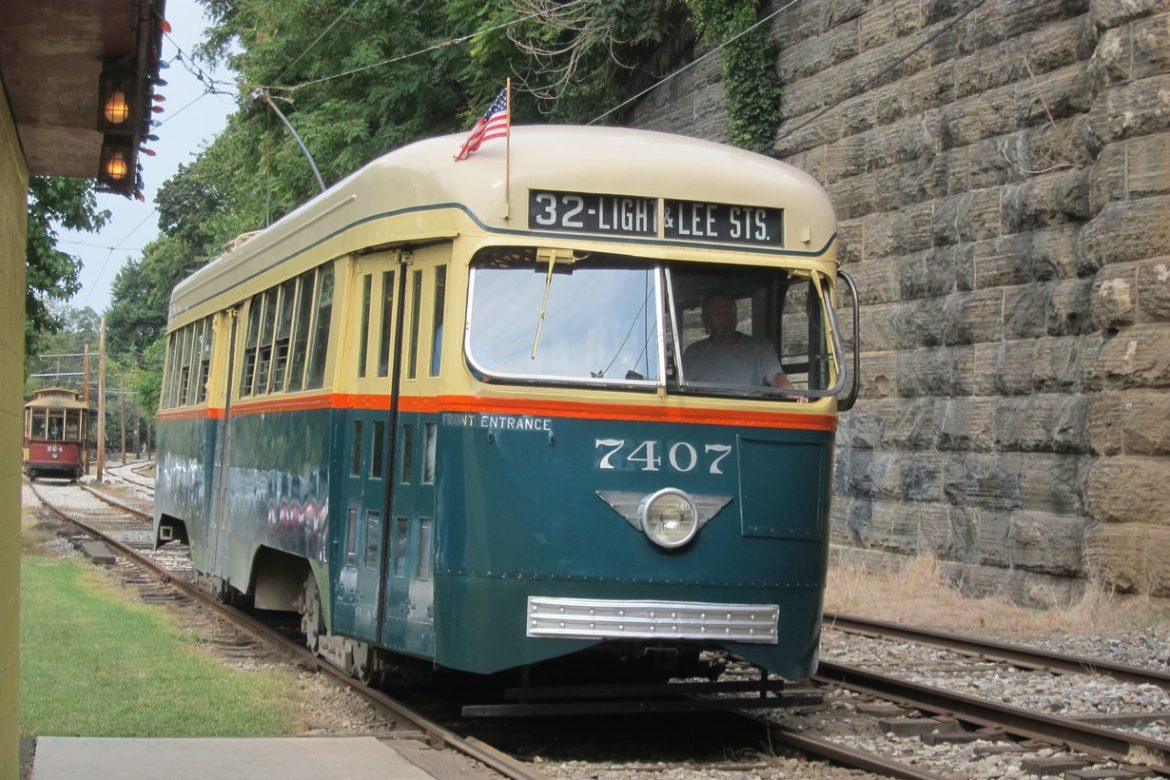 Green and cream PCC streetcar 7407 on the tracks at the Baltimore Streetcar Museum on Falls Road