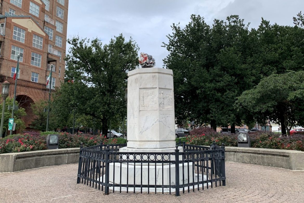 Empty pedestal at the former site of the Christopher Columbus statue in Baltimore's Little Italy