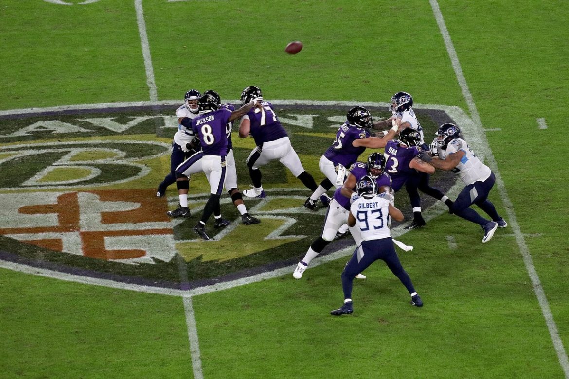 Baltimore Ravens quarterback Lamar Jackson throws a pass at M&T Bank Stadium