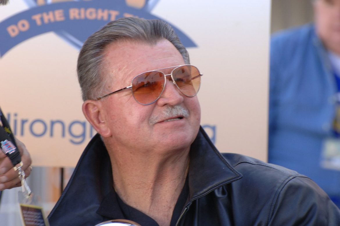 Mike Ditka in sunglasses and a leather jacket at the NFL Experience in 2008